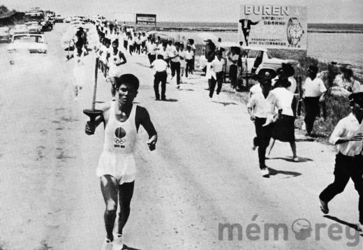 1964 wurde das olympische Feuer vor einer «Büren»-Reklame nach Tokio getragen